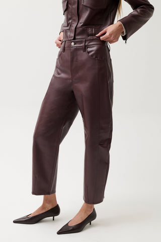 The Eli High Rise Arched Leg Pant in Cabernet